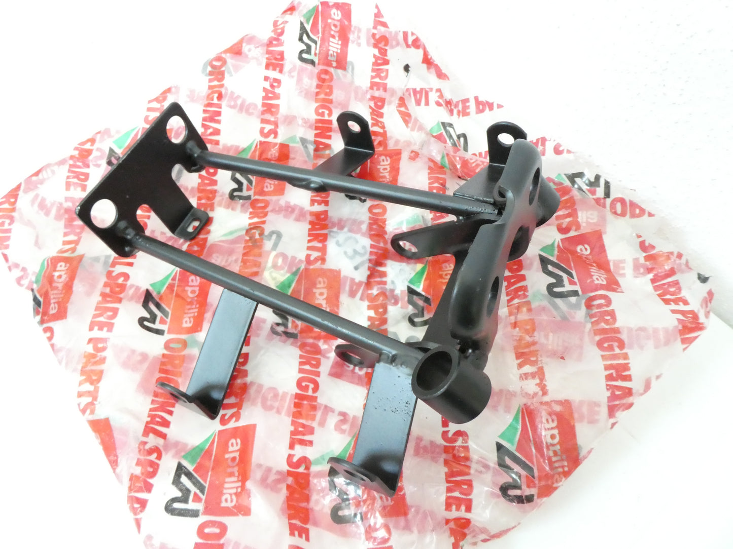 Aprilia europa 50 staffa supporto telaietto telaio faro frecce moto 1991 1992 8234036